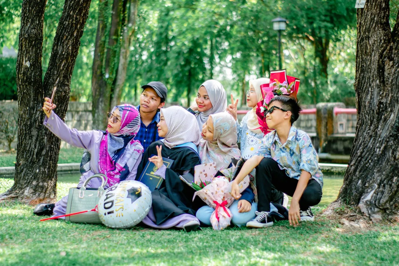 A family celebrating together outdoors