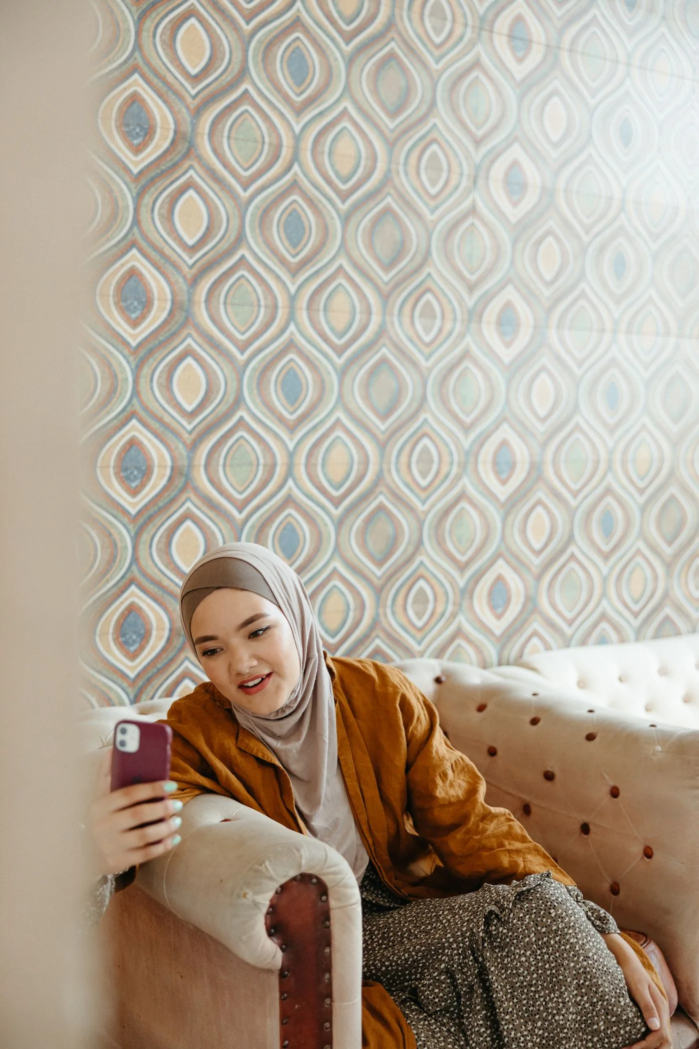A woman reading her health report on a phone
