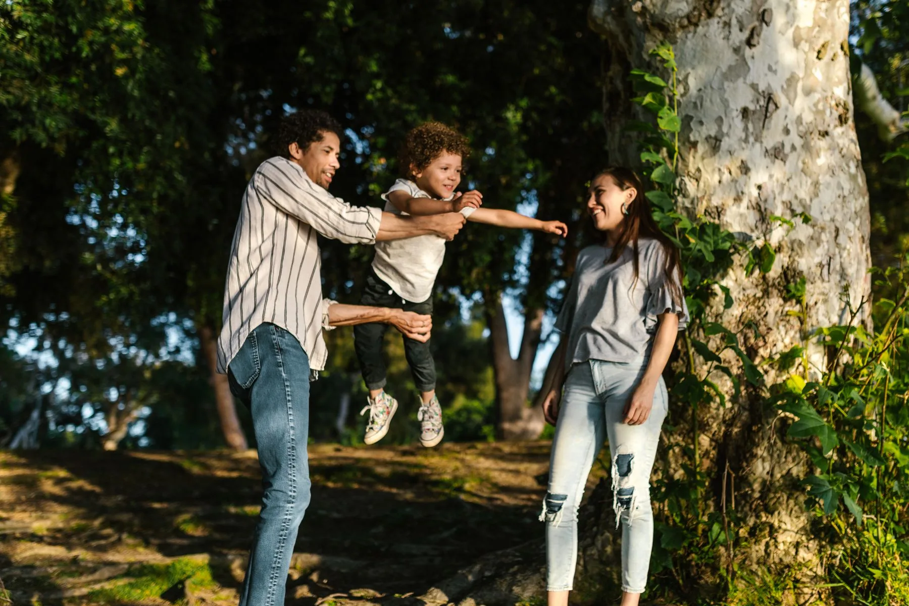 A family playing together outdoors